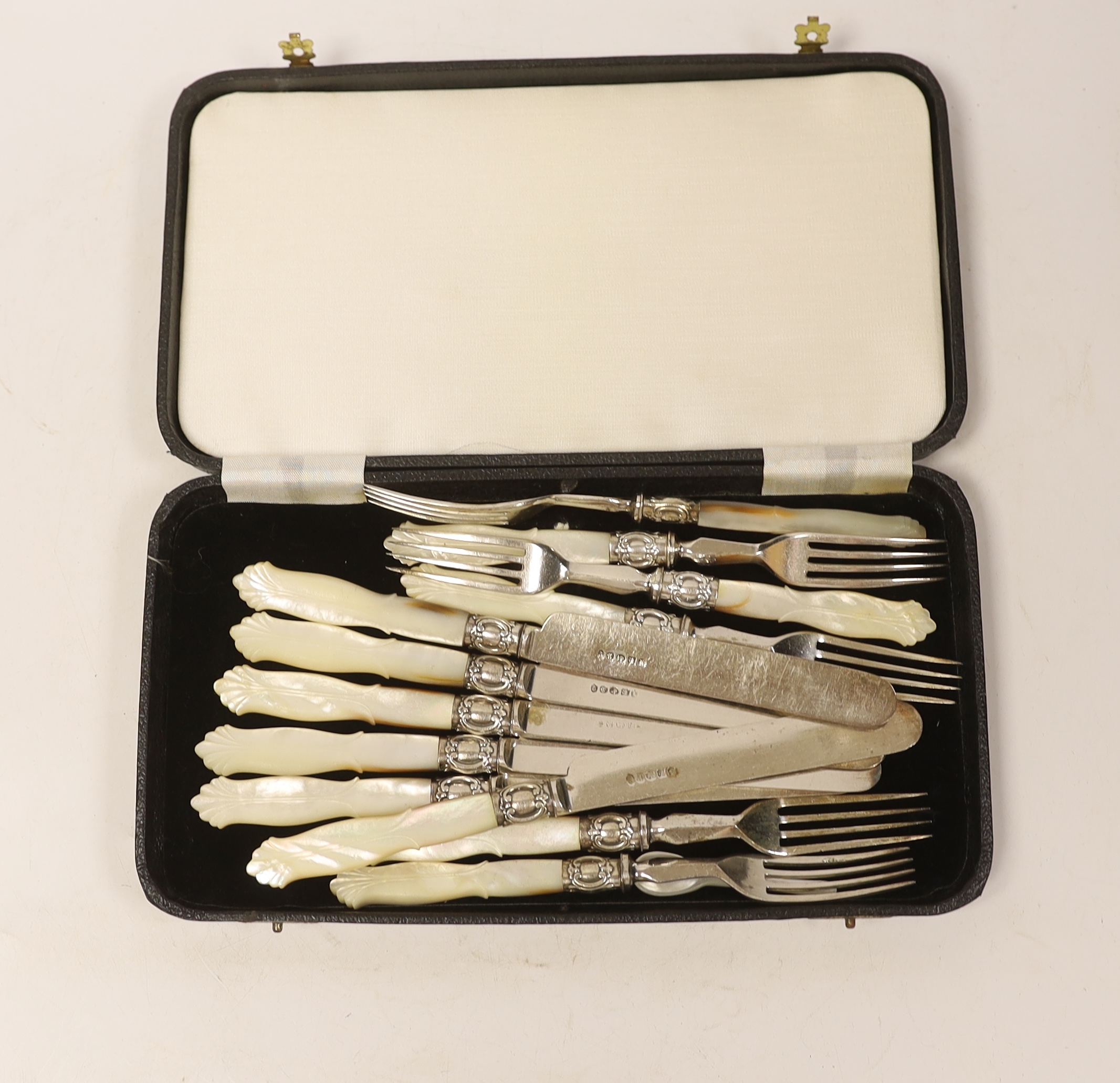 A cased set of plated fruit knives and forks